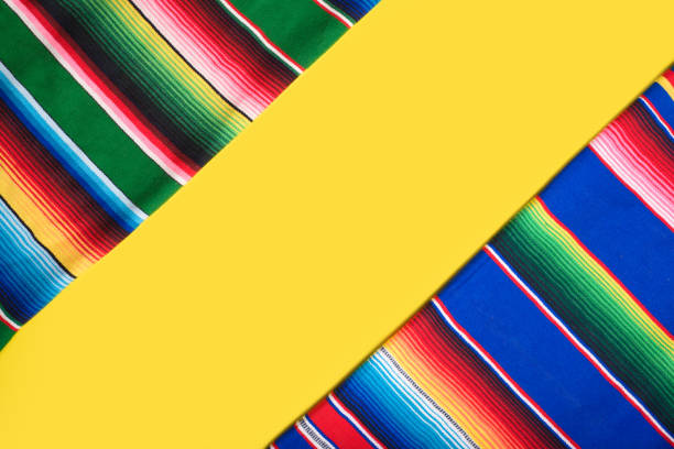 istock Serape on yellow background. Cinco de mayo background. 2099667479