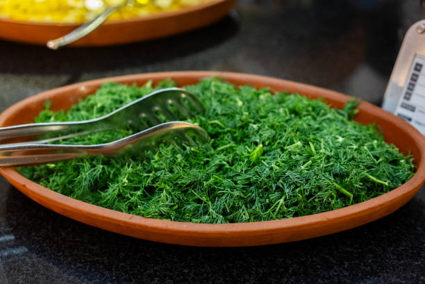A plate of dill standing on the table for service