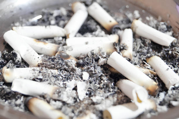 istock A pile of burnt cigarette butts in a pan 2099679865