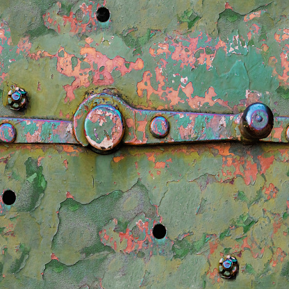 Seamless texture photo of rusty and worn armored green colored vehicle surface.