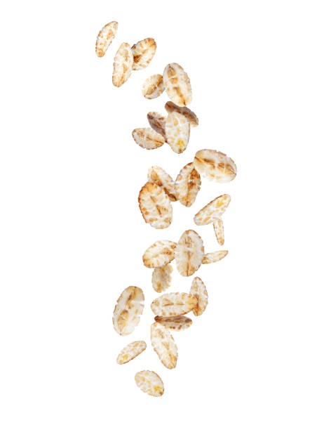istock Oatmeal in the air close up. Cereals falling down isolated on a white background 2099692212