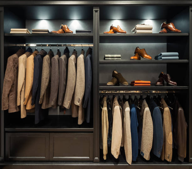 istock Wardrobe with man costumes. 2099694392