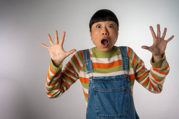 istock Woman looking in surprise 2099696069