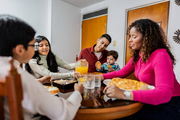 istock Family having breakfast together at home 2099705240
