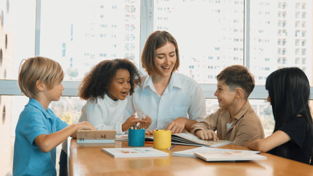 istock Happy student and smart teacher drawing and coloring by using marker. Erudition. 2099708434