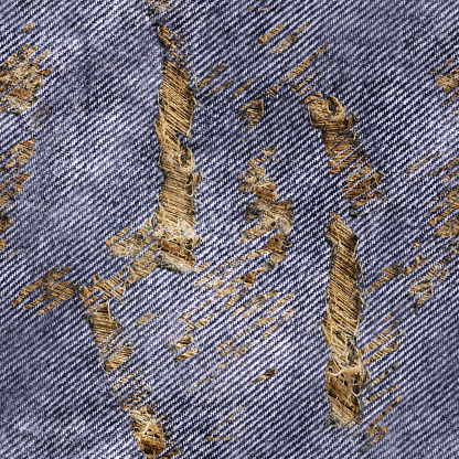 Seamless texture photo of blue colored cutted torn and worn denim or jeans material.
