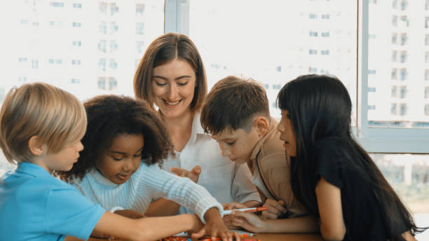 istock Professional caucasian teacher telling story to diverse student. Erudition. 2099721434
