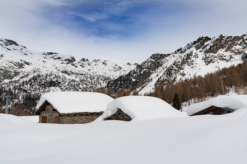 Mountain shelter in Ecrins National Park, near Gap, in Hautes-Alpes department, southern France, during winter.