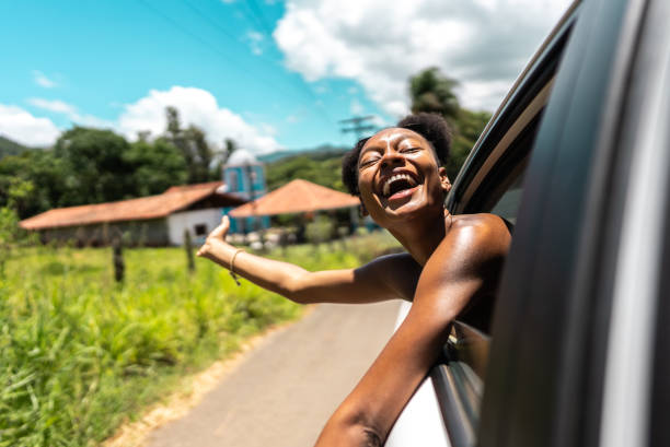 istock Young woman traveling by car 2099761729