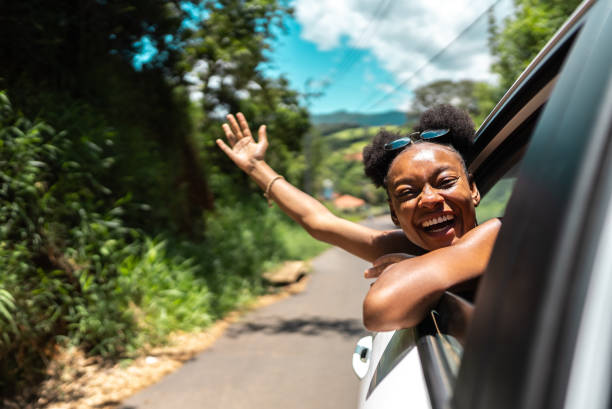 istock Young woman traveling by car 2099761891