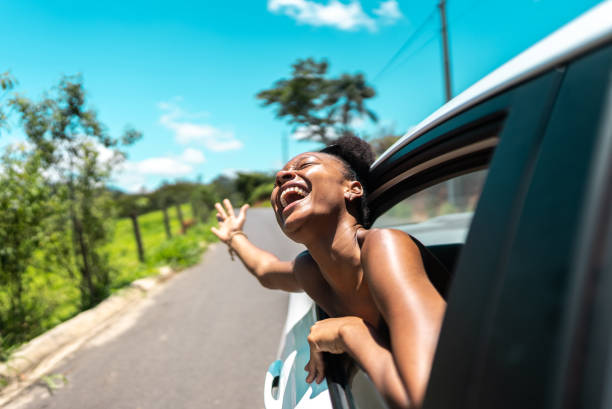 istock Young woman traveling by car 2099762036
