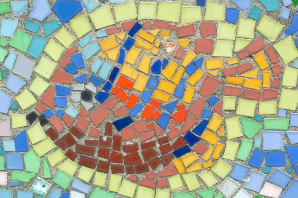 Multi colored tiles pattern, wall or flooring decoration, sunbeam shape . Traditional trencadis decoration, construction material, full frame image suitable for backgrounds . Spain.