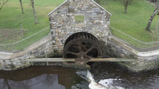 Historic waterwheel at Ballinode in Monaghan, Ireland generating eco-friendly power
