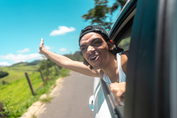 istock Young man traveling by car 2099768189