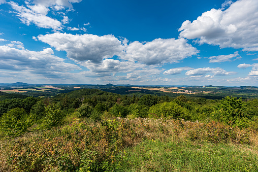 Beautiful rolling landscape with mix of fields, meadows and smaller hills - Ceska Lipa region from Nedvezi hill near Duba town in Czech republic