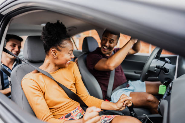 istock Friends dancing inside a car during a road trip 2099802761