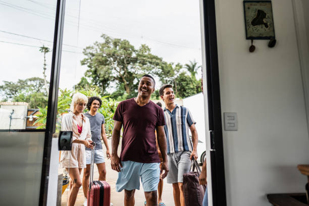 istock Friends arriving on a vacation house rental 2099803842