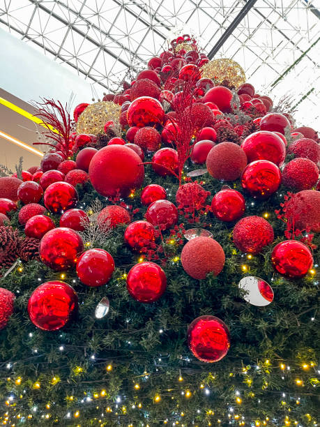 istock Decorated Christmas tree red baubles 2099838958