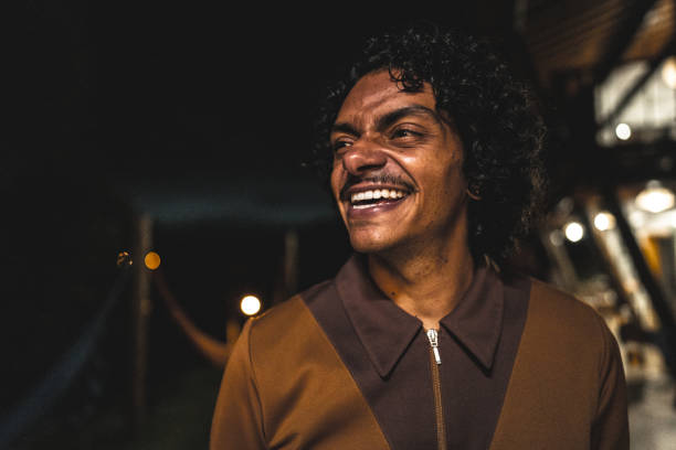 istock Happy young man on house yard at night 2099856784