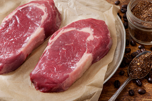 Preparing Coffee Dry Rubbed Boneless Rib Eye Steaks with coffee, paprika, garlic and onion powder, salt, pepper and cumin