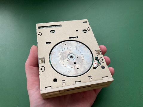 KYIV, UKRAINE - March 20, 2024: Floppy computer retro disk drive for storing information