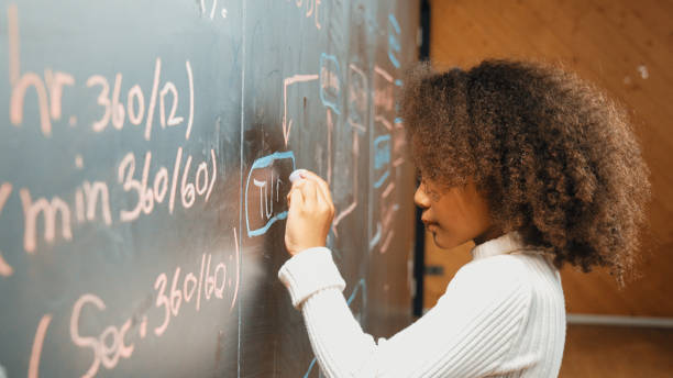 istock Site view of young african girl write engineering prompt or code. Erudition. 2099952497