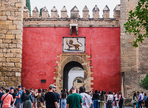 Seville, Spain-March 20, 2024: Gate of the Real Alcazares of Seville, on Avenida de la Constitución, city center of Seville.
