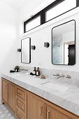 a-bathroom-detail-with-a-white-oak-cabinet-and-marble-countertop.jpg?b=1&s=170x170&k=20&c=dTPrchkHXEiqAJMbxU05pTYgW0YbDjnmjplOE-Vw-4c=