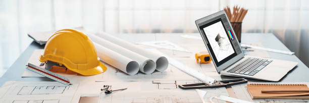istock Digital blueprint by architecture design software on laptop screen. Insight 2100035054