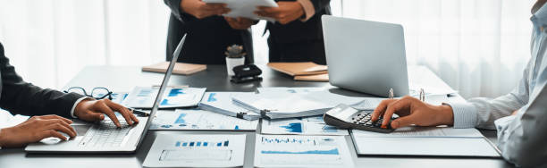 istock Team of analyst working on financial data analysis dashboard on paper. Insight 2100037165