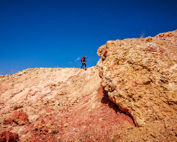 istock Man walks on top of a summit - Spain 2100070990