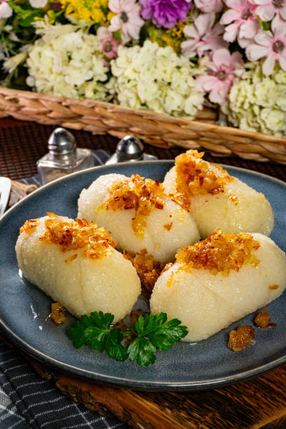 istock Kartacze - potato dumplings stuffed with minced meat. 2100072047