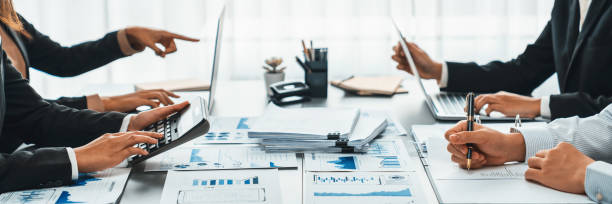 istock Team of analyst working on financial data analysis dashboard on paper. Insight 2100076766