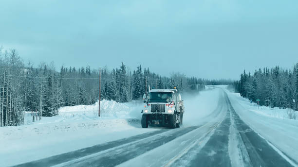 istock Snow plow in Alaska 2100095311