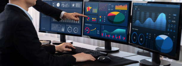 istock Analyst working on BI dashboard on computer monitor. Trailblazing 2100125238