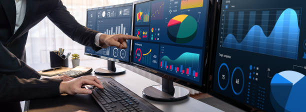 istock Analyst working on BI dashboard on computer monitor. Trailblazing 2100190585