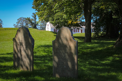 Annapolis Royal, Nova Scotia, Canada - August 2023: View on graves in front of Fort Anne in Annapolis Royal, formerly known as Port Royal, it has one of the oldest histories in North America. It was also Acadia's (and Nova Scotia's) capital. It is a National Historic Site of Canada.