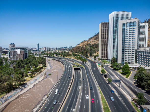 istock Urban highways running alongside Mapocho river in Santiago 2100288860