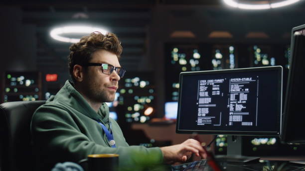 istock Software engineer looking monitors in monitoring office closeup. Analyst typing 2100310597