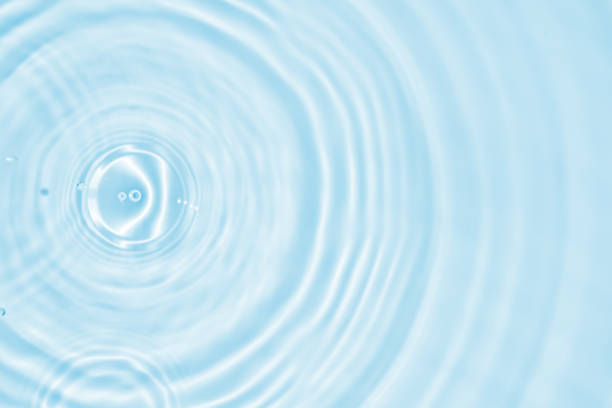 istock Abstract transparent water shadow surface texture natural ripple on blue background 2100387462