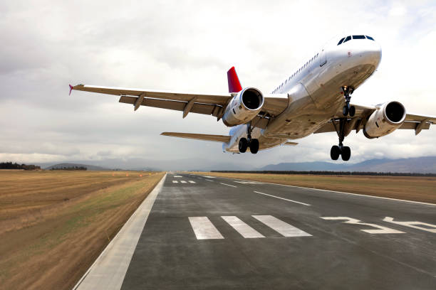 An aircraft arriving at Wellington International Airport, New Zealand, on an overcast cloudy day.