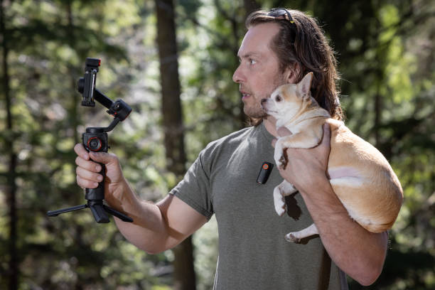 istock Filming a video with my dog 2100484937