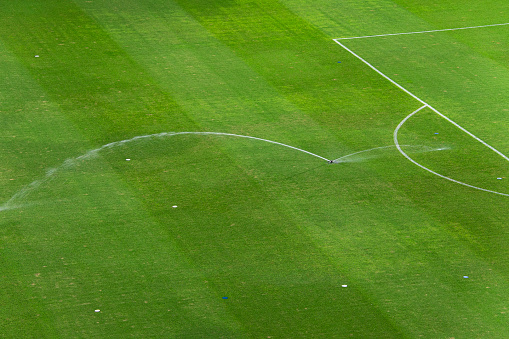 Part of a soccer field, being watered, in the city of Rosario, Argentina.