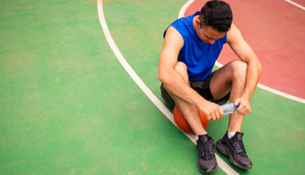 istock Top view of man taking rest from basketball training 2100537064