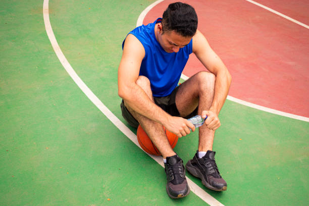 istock Top view of man taking rest from basketball training 2100537067