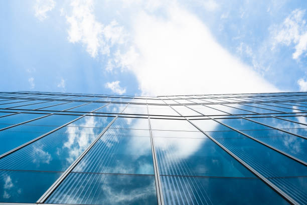 istock Glass Building and Blue Sky with Clouds 2100558377