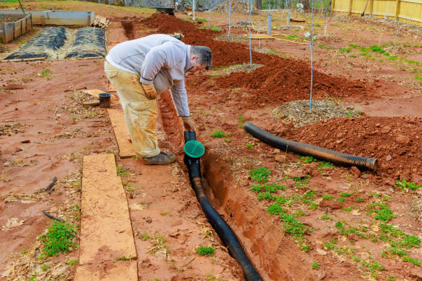 istock Installation of an underground drainage system to allow rainwater a stormwater to exit 2100568443