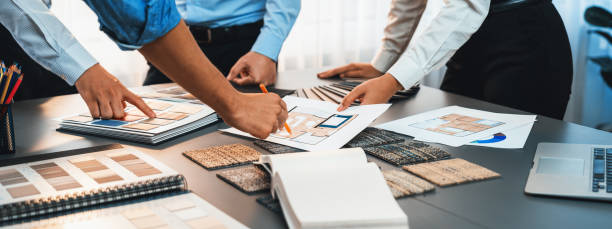 istock Group of interior designer team in meeting and discussing. Insight 2100620654