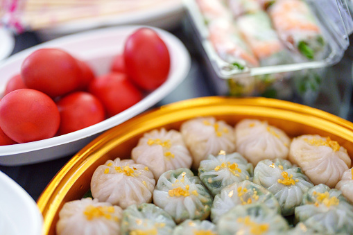 A tray of steamed vegetable dumplings, also known as 