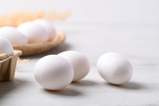 Organic white leghorn egg from free range farm on white table